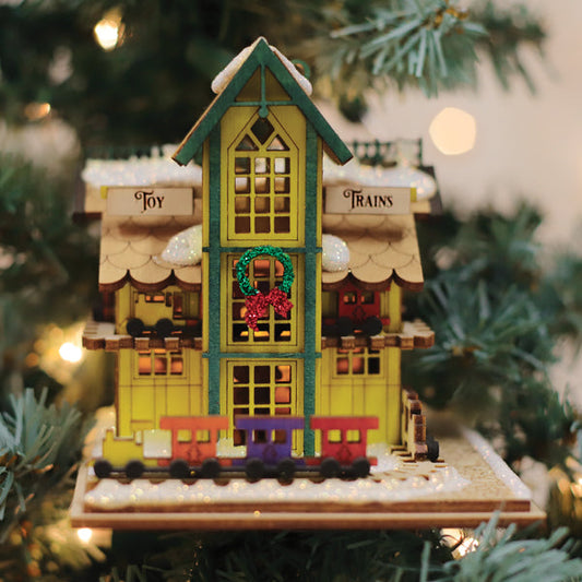 Whimsical Toy Train Shop Holiday Ornament