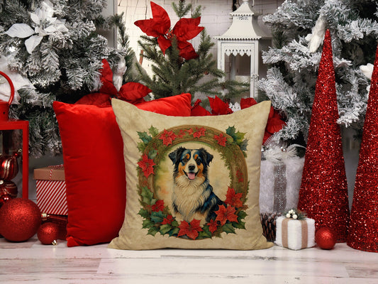 Christmas-themed scene with red glitter cone trees, white and flocked Christmas trees, red and white striped gift box, and a decorative pillow featuring a dog portrait surrounded by poinsettias.
